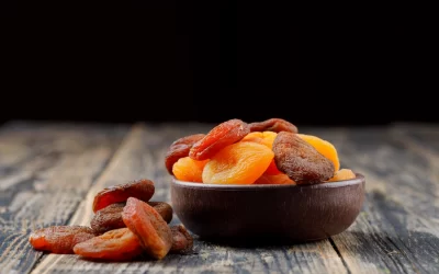 dried-apricots-clay-bowl-wooden-table